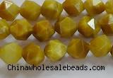 CNG6530 15.5 inches 6mm faceted nuggets golden tiger eye beads