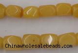 CNG807 15.5 inches 9*12mm faceted nuggets yellow jade beads