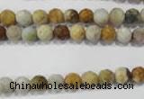 COS151 15.5 inches 6mm faceted round ocean stone beads wholesale