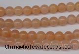 CPE02 15.5 inches 6mm round peach stone beads wholesale