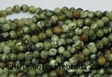 CPS54 15.5 inches 4mm faceted round green peacock stone beads