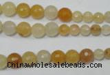 CRO726 15.5 inches 6mm – 14mm faceted round yellow jade beads