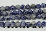 CRO771 15.5 inches 6mm faceted round blue spot stone beads wholesale