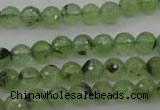 CRU152 15.5 inches 8mm faceted round green rutilated quartz beads