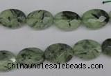 CRU188 15.5 inches 10*14mm faceted oval green rutilated quartz beads