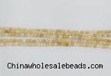 CRU665 15.5 inches 3mm faceted round golden rutilated quartz beads