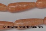 CSM15 15.5 inches 10*30mm teardrop salmon stone beads wholesale