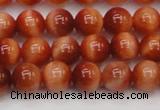 CTE1661 15.5 inches 6mm round sun orange tiger eye beads