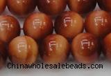 CTE1665 15.5 inches 14mm round sun orange tiger eye beads