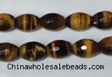 CTE207 15.5 inches 8*10mm faceted rice yellow tiger eye beads