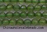 CTG512 15.5 inches 4mm faceted round tiny green apatite beads
