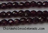 CTG555 15.5 inches 4mm faceted round tiny purple garnet beads