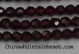 CTG556 15.5 inches 4mm faceted round tiny red garnet beads