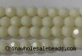 CTU1440 15.5 inches 4mm faceted round synthetic turquoise beads