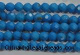 CTU1631 15.5 inches 6mm faceted round synthetic turquoise beads