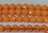 CTU2540 15.5 inches 6mm faceted round synthetic turquoise beads