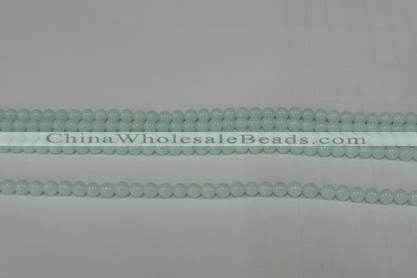 CTU2563 15.5 inches 4mm round synthetic turquoise beads