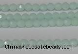 CTU2571 15.5 inches 4mm faceted round synthetic turquoise beads