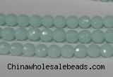 CTU2572 15.5 inches 6mm faceted round synthetic turquoise beads