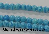 CTU2580 15.5 inches 4mm round synthetic turquoise beads