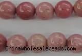 CWF14 15.5 inches 10mm round pink wooden fossil jasper beads