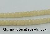 CYJ63 15.5 inches 6*7mm vase-shaped yellow jade gemstone beads wholesale