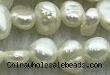 FWP234 14.5 inches 3mm - 4mm baroque white freshwater pearl strands