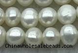 FWP26 14.5 inches 4mm - 4.5mm potato white freshwater pearl strands