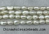 FWP285 15 inches 9mm - 10mm baroque white freshwater pearl strands