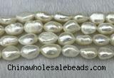 FWP304 15 inches 11mm - 12mm baroque white freshwater pearl strands