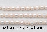 FWP488 14.5 inches 10mm - 11mm potato white freshwater pearl strands