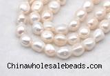 FWP504 14 inches 11mm - 12mm baroque white freshwater pearl strands